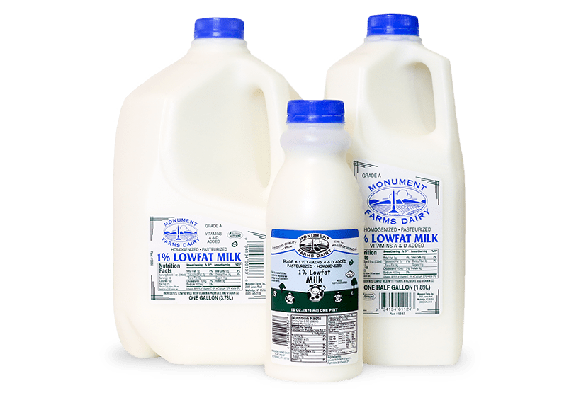 A pint, half gallon, and gallon jug of Monument Farms local 1% milk.