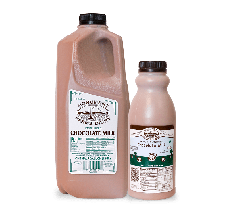 A pint and half gallon of Monument Farms whole local chocolate milk.