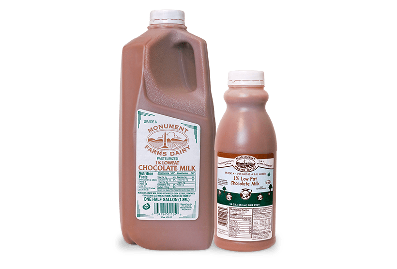 A pint and half gallon of Monument Farms 1% local chocolate milk.