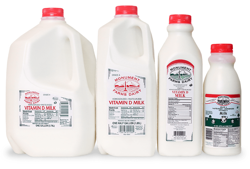 A pint, quart, half gallon, and gallon jug of Monument Farms local whole milk.