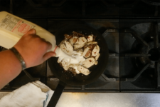 Monument fresh heavy cream is added to roasted chicken and bacon lardons simmering on the stove. Step two in the Cavatappi Carbonara recipe shared by the chefs at Leunig's Bistro as one of their local Vermont recipes made with Monument fresh local heavy cream.